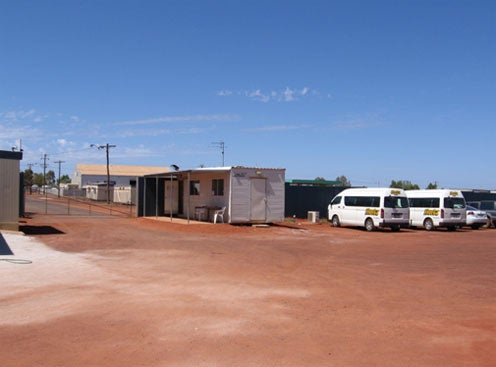 Front gate and entrance to car park