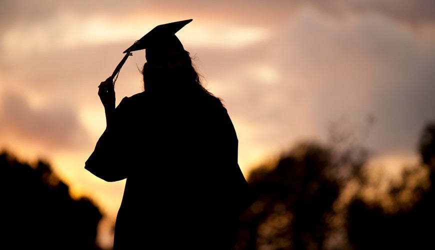 Portrait of a graduate in cap and gown