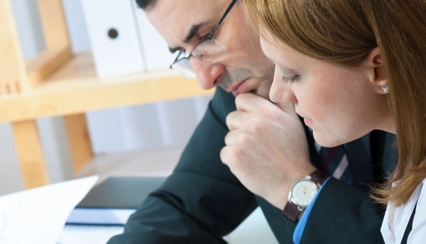 Man and woman in business meeting