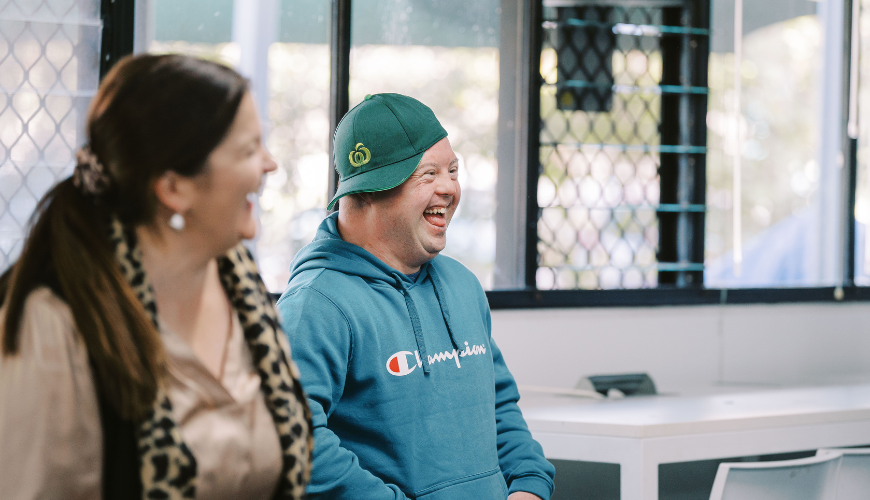 Good Sammy's Jodee Coleman, with Neil, who accepting an ongoing role at a Woolworths store after completing an IncludeAbility pilot.