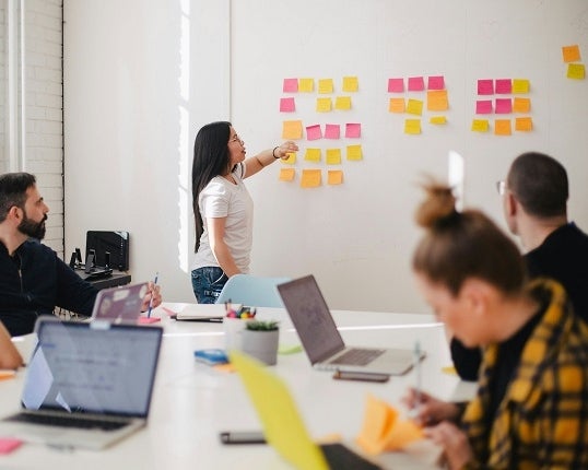 People undergoing training in an office space