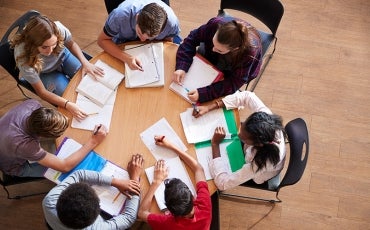 school children working on assignment