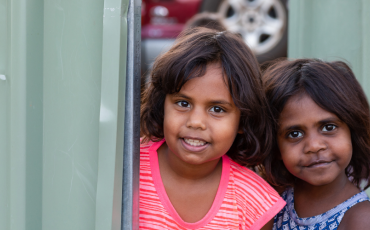 Two girls smiling