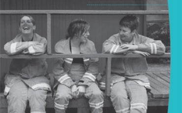 Cover of Annual Report 2012-13. Volunteer firefighters sit on a verandah chatting