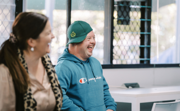 Good Sammy's Jodee Coleman, with Neil, who accepting an ongoing role at a Woolworths store after completing an IncludeAbility pilot.