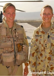 Women soldiers with helicopter. Image (c) Defence