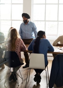 Diverse group of business people in meeting.