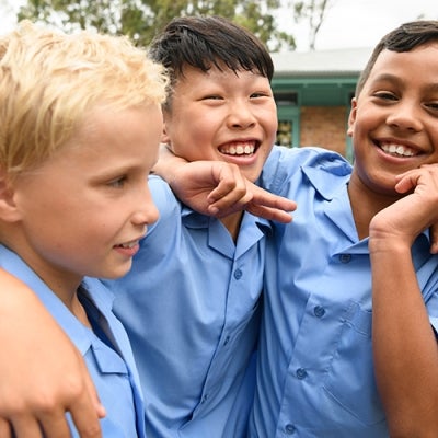 three school boys playing