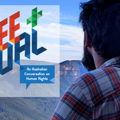 'Free and Equal' logo on top of a photo of a man looking out at mountains