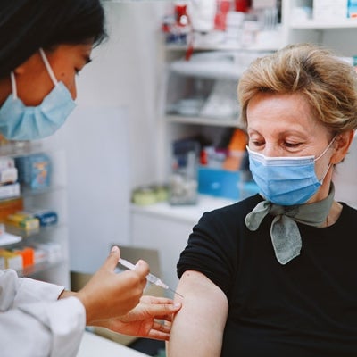 Nurse giving COVID vaccination