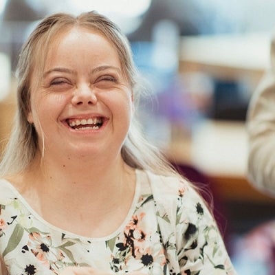 Customer with disability, in a cafe