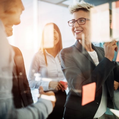 Diverse group of business people planning strategy in office together