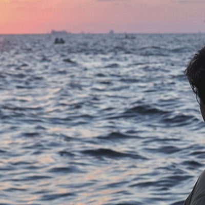 man looking out to sea